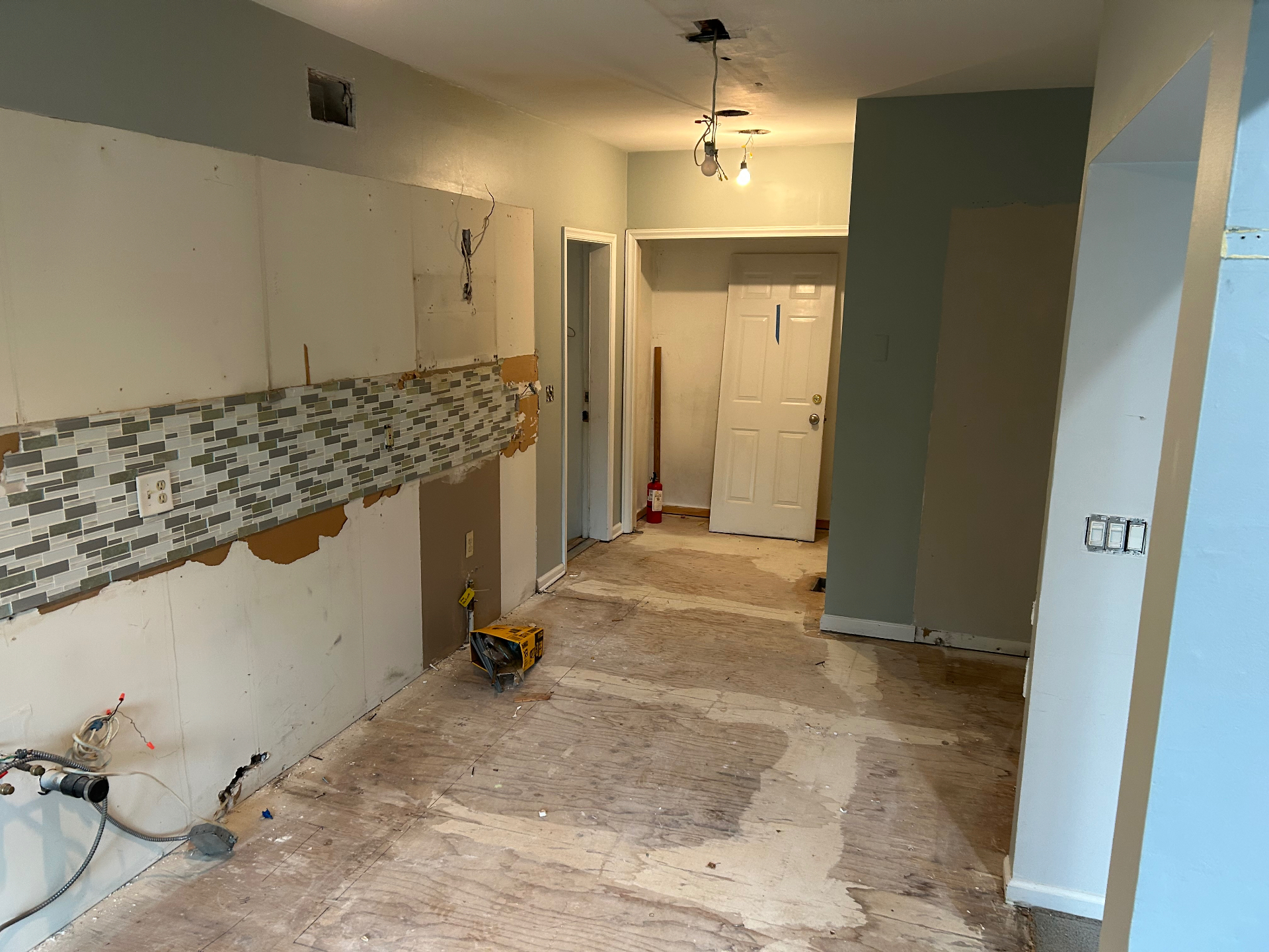 Interior demolition cleanup with doors, debris, and bulky materials removed in New Jersey — after
